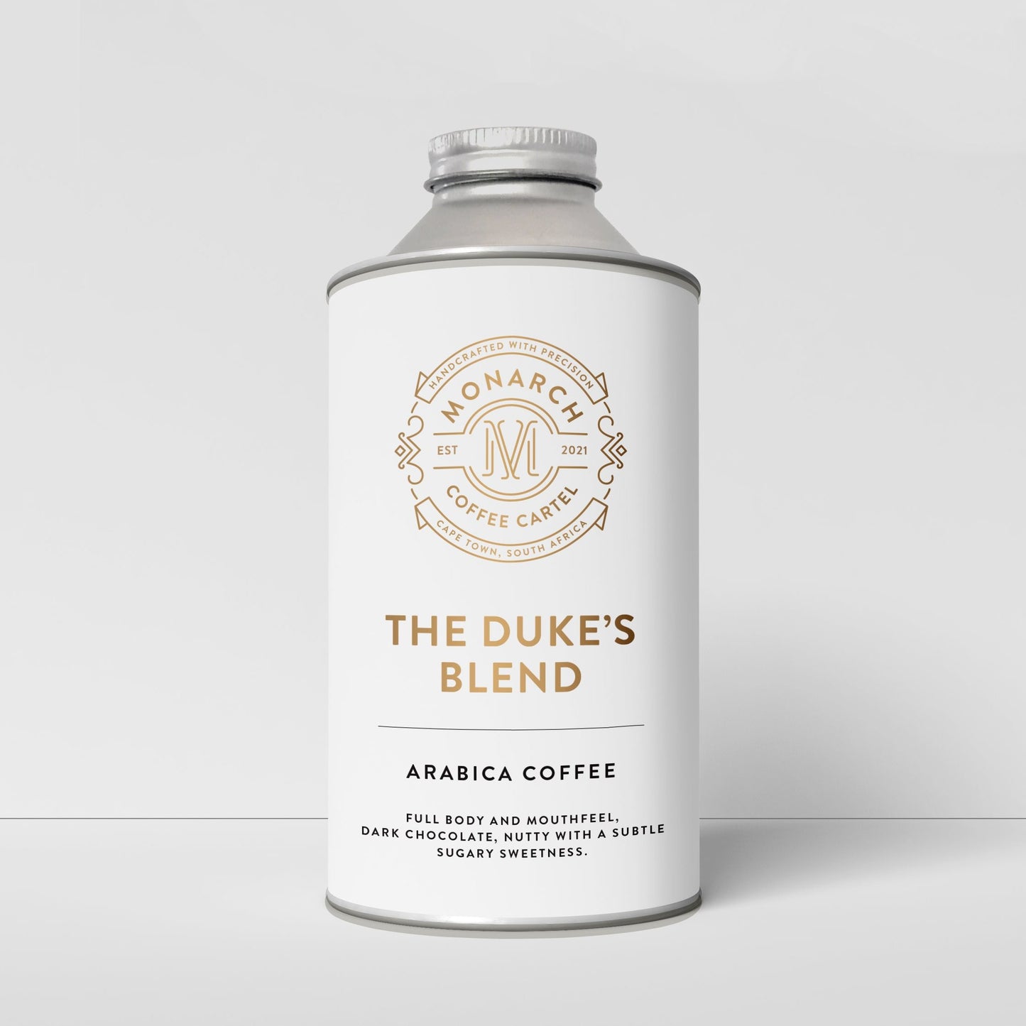 A container of Monarch Coffee Cartel's The Duke's Blend Arabica coffee with branding and product information displayed on the label.